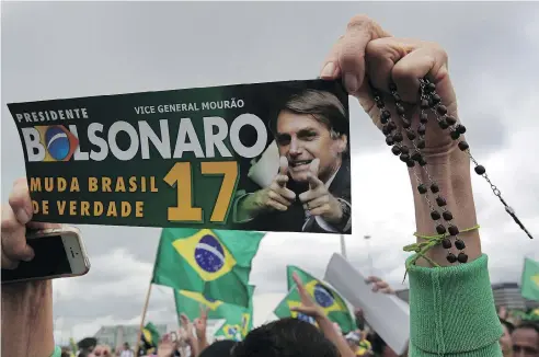  ?? ERALDO PERES / THE ASSOCIATED PRESS ?? The election Sunday of Jair Bolsonaro as president of Brazil lifted local stocks on Monday.