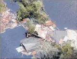  ?? STEVE HELBER | ASSOCIATED PRESS ?? A HOME was destroyed along the Neuse River in New Bern, N.C., after Tropical Storm Florence came through the area Saturday.