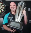  ??  ?? World Champion Rob Cross