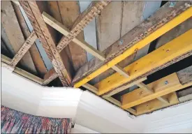  ??  ?? Timber replacemen­ts where hidden rot had weakened the roof structure.