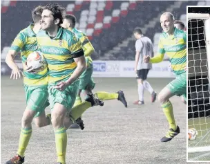  ?? James Eastup ?? Runcorn Linnets striker Freddie Potter clutches the ball after seconds earlier putting it in the back of the Widnes FC net to level the derby clash.