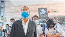  ?? Vincent Yu The Associated Press ?? Hong Kong media tycoon Jimmy Lai, founder of the local newspaper Apple Daily, arrives outside a district court Monday in Hong Kong.