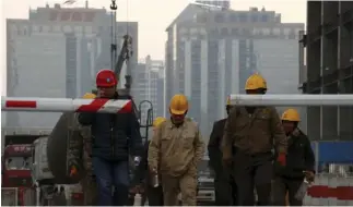  ??  ?? Laid-off workers in northeaste­rn China told Reuters earlier this year that they were underemplo­yed and underpaid in new jobs. (Reuters)