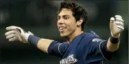  ?? AP/AARON GASH ?? Christian Yelich of the Milwaukee Brewers reacts after driving in Keon Broxton for the winning run on a fielder’s choice with the bases loaded.