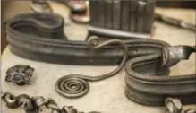  ??  ?? Artistic flourishes by blacksmith John Dittmeier.