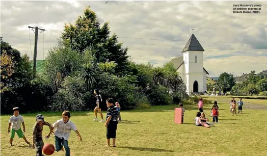  ??  ?? Sara McIntyre’s photo of children playing at Ka¯ kahi Marae, 2008.