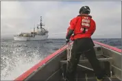  ?? Petty Officer 3rd Class Mikaela McGee / U.S. Coast Guard ?? U.S. Coast Guard Petty Officer 2nd Class Eric Risdon, a damage controlman assigned to U.S. Coast Guard Cutter Forward (WMEC-911), mans a line on a small boat as it approaches the cutter on Sept. 9, 2023, in the Atlantic Ocean.