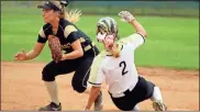  ?? / Jeremy Stewart ?? Rockmart shortstop Kinsey Jones (left) watches the throw to second base as Pepperell’s Josie McGraw slides for the steal during the second inning of a Region 7-AA game in Lindale on Wednesday.