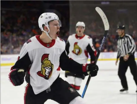  ?? DERIK HAMILTON – THE ASSOCIATED PRESS ?? Ottawa’s Brady Tkachuk celebrates after scoring a goal during the third period Tuesday night at Wells Fargo Center. He led the Senators to a 4-3 come-from-behind victory.