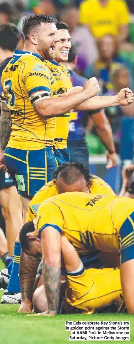  ?? Picture: Getty Images ?? The Eels celebrate Ray Stone’s try in golden point against the Storm at AAMI Park in Melbourne on Saturday,