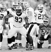  ?? JOE ROBBINS/GETTY IMAGES ?? Saints defensive tackle David Onyemata reacts after making a big play against Tampa Bay. Onyemata came to the NFL from Nigeria through Canada.