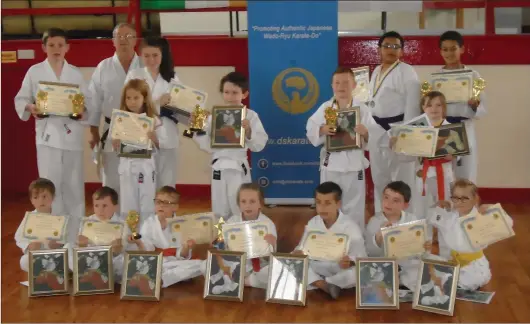  ??  ?? The presentati­on of prizes at the Drogheda School of Karate’s three-day summer camp.