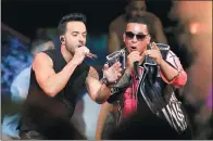  ?? LYNNE SLADKY / AP ?? Singers Luis Fonsi (left) and Daddy Yankee perform during a show in Florida. Their song Despacito has topped the Billboard Hot 100 chart for 13 weeks and counting.