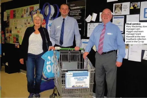  ??  ?? Vital service Mary Mackinlay, store manager Liam Higgins and team manager Grant Maxwell at the new Foodbank collection point in the Co-op