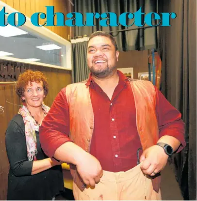  ??  ?? Pene Pati tries on his pair of painted trousers with head of wardrobe Sophie Ham; a rainbow of large cotton spools. Photos / Doug Sherring