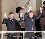  ?? Arkansas Democrat-Gazette/MITCHELL PE MASILUN ?? University of Arkansas, Fayettevil­le head football coach Chad Morris (left) and UA Athletic Director Hunter Yurachek join in calling the Hogs from the gallery of the state House chamber before Wednesday’s session.