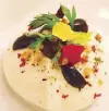  ??  ?? Amuse-bouche of mozzarella foam, cherrytoma­to mousse, fresh herbs and Kalamata olives at Ristorante Casanova