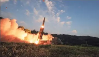  ?? AP PHOTO VIA SOUTH KOREA DEFENSE MINISTRY ?? In this Monday photo provided by South Korea Defense Ministry, South Korea’s Hyunmoo II ballistic missile is fired during an exercise at an undisclose­d location in South Korea.