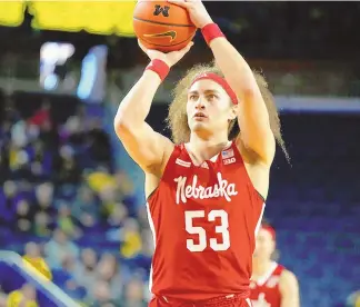  ?? CARLOS OSORIO / ASSOCIATED PRESS ?? Nebraska forward Josiah Allick shoots a free throw during a March 10 game in Ann Arbor, Mich. Allick played for UNM last season but transferre­d back to his home state in the offseason.