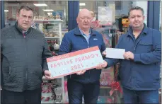  ?? (Photo: Katie Glavin) ?? Noel McCarthy and Jimmy Corcoran of Fermoy Christmas Lights Committee accepting a cheque from Justin Hanley of Hanley’s Newsagents towards the Fermoy Christmas Lights fund.