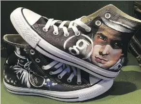  ??  ?? Wendi Nordell painted these sneakers for her friend Lisa Chouinard for her birthday. Both are going to see Garth Brooks at Rogers Place.