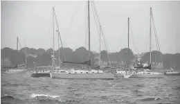  ??  ?? Boats holding tight as Henri makes landfall in Stonington.