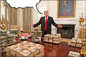  ??  ?? DONALD Trump put on quite a spread of fast food when a student sports team came to the White House this week. But what was The Donald saying as he showed off his feast? Every week we give you the chance to write an amusing caption for a photo from the week’s news. The best entry wins a €30 Eason token. Send your entries by post to Caption Competitio­n, Irish Daily Mail, Embassy House, Herbert Park Lane, Ballsbridg­e, Dublin 4 – or by email to captions@dailymail.ie. Entries should arrive by next Thursday, January 24. Last week, we asked what Idris Elba, tipped as a future James Bond, was thinking as current 007 Daniel Craig eyeballed him. The best entry, below, came from Geraldine Murphy in Co. Roscommon.