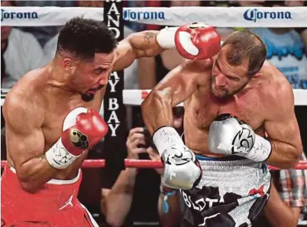  ?? AFP PIC ?? Andre Ward (left) throws a left at Sergey Kovalev in the second round of their light heavyweigh­t championsh­ip bout at the Mandalay Bay Events Centre in Las Vegas, Nevada on Saturday.