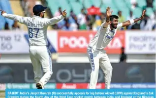  ?? ?? RAJKOT: India’s Jasprit Bumrah (R) successful­ly appeals for leg before wicket (LBW) against England’s Zak Crawley during the fourth day of the third Test cricket match between India and England at the Niranjan Shah Stadium in Rajkot. — AFP