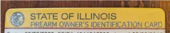  ?? DALE BOWMAN/SUN-TIMES ?? Illinois residents need a Firearm Owner’s Identifica­tion Card (FOID card) to legally possess firearms or ammunition, such as this still life of a 12-gauge shotgun, a .22 rifle and a 20-gauge shotgun with shotgun shells and slugs atop an ammo box.