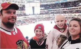  ?? SPECIAL TO NIAGARA THIS WEEK ?? The Egerters, from left, Jay, Christophe­r, Adam and Tanya take in a Chicago Blackhawks game.