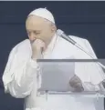  ??  ?? 0 Pope Francis coughs during his address yesterday
