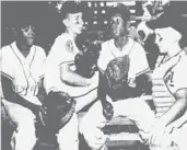  ?? ORLANDO SENTINEL FILE PHOTO ?? Little Leaguers, from left, Dick Morris, Johnny Lane, Bob East and Gary Fleming talk after their Aug. 9, 1955, game in Orlando — the focus of the documentar­y “Long Time Coming: A 1955 Baseball Story.”