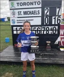  ??  ?? Clodagh Fox with her Player of the Match award and the cup.