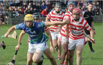  ??  ?? Glynn-Barntown’s Ian Moran is marginally out in front in this race for possession.