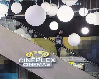  ?? NATHAN DENETTE THE CANADIAN PRESS ?? Cineplex says sequels to the superhero hits delivered increasing audience numbers and money spent at concession stands in its last quarter.