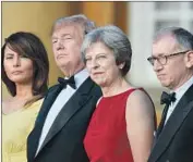  ?? Geoff Pugh Pool Photo ?? PRESIDENT Trump and British Prime Minister Theresa May with their spouses, Melania Trump and Philip May, at Blenheim Palace, west of London.