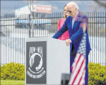  ?? Alex Brandon The Associated Press ?? President Joe Biden pauses on Wednesday at a Scranton war memorial. Biden said Donald Trump was unworthy of serving as commander in chief.