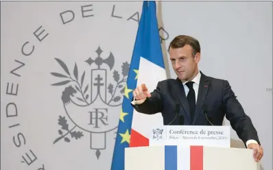  ?? (AFP) ?? French President Emmanuel Macron holds a press conference at the French embassy at the end of his three days official visit in China, in Beijing, on Wednesday.