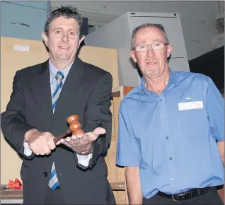  ??  ?? UNDER THE HAMMER: Phil Clark from First National Real Estate Ararat will be guest auctioneer at an East Grampians Health Service Murray to Moyne Cycle Relay Surplus Auction. He is pictured with team member Alan Young.