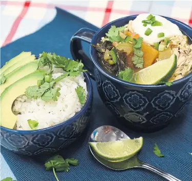  ?? KARON LIU TORONTO STAR ?? Add poached shredded chicken, sour cream, cilantro and a wedge of lime to give the soup a Tex-Mex twist. Serve with a side of cooked rice and avocado slices.