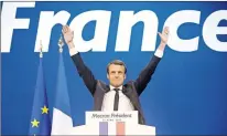  ?? AP PHOTO ?? French centrist presidenti­al candidate Emmanuel Macron waves before addressing his supporters at his election day headquarte­rs in Paris Sunday.