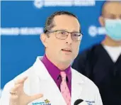  ?? AMY BETH BENNETT/SOUTH FLORIDA SUN SENTINEL ?? Broward Health Medical Center Chief Medical Officer Dr. Joshua Lenchus speaks at a news conference Tuesday at Broward Health Medical Center in Fort Lauderdale.