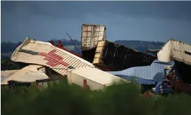  ?? ?? Shipping containers were thrown from the tracks when a freight train derailed in Victoria's west outside Geelong. Photograph: James Ross/EPA