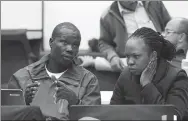  ?? PROVIDED TO CHINA DAILY ?? Brenda Fiona Kazule listens attentivel­y to a fellow student during a group discussion in class.