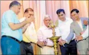  ??  ?? DCP Rishi Pal and other dignitarie­s lighting the lamp at GD Goenka.