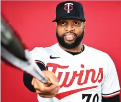  ?? (Julio Aguilar/getty Images/tns) ?? Carlos Santana of the Minnesota Twins poses Feb. 22 during the team’s photo day at the Lee County Sports Complex in Fort Myers, Florida.