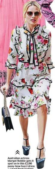  ??  ?? Australian actress Margot Robbie gets it spot on in this £2,190 pussy-bow Gucci dress — saved from looking too prim by rock star platform shoes.