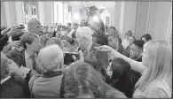  ?? The New York Times/DOUG MILLS ?? Sen. John Cornyn, R-Texas, faces a Capitol Hill hallway full of reporters earlier this month.