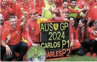  ?? Picture: MARK PETERSON/REUTERS ?? REVVED UP: Ferrari’s Carlos Sainz Jnr celebrates with his team after winning the Australian Grand Prix along with second-placed Charles Leclerc at Melbourne Grand Prix Circuit on Sunday